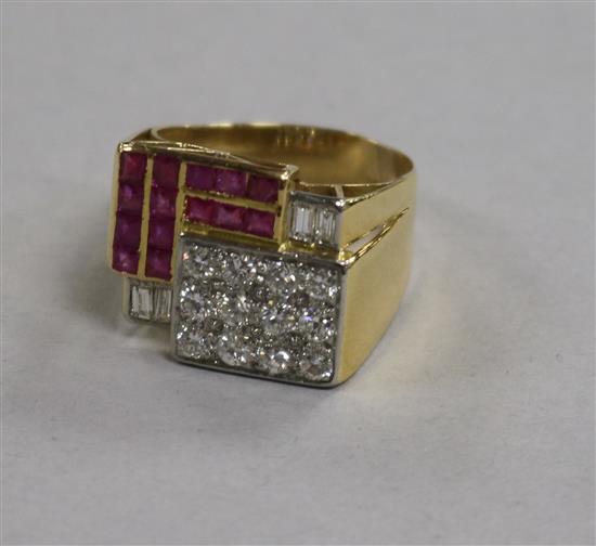 A 1950s? 18ct gold, pave set ruby and diamond cocktail ring, size O.